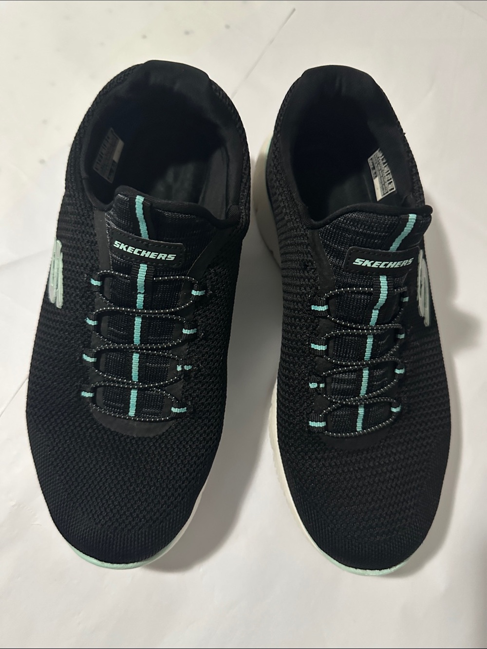 Skechers Women's Black Knit Slip-On Sneakers with Mint Accents